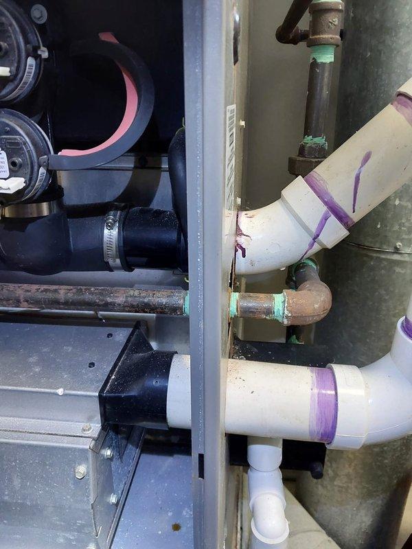 Performed routine bi-system furnace maintenance on aging Lennox units showing signs of dust accumulation and corrosion. Inspected electrical components and circuit boards, noting oxidation on copper pipes and possible moisture issues at the condensate drain connections. Systems operational but exhibiting age-related wear requiring monitoring during future service visits.