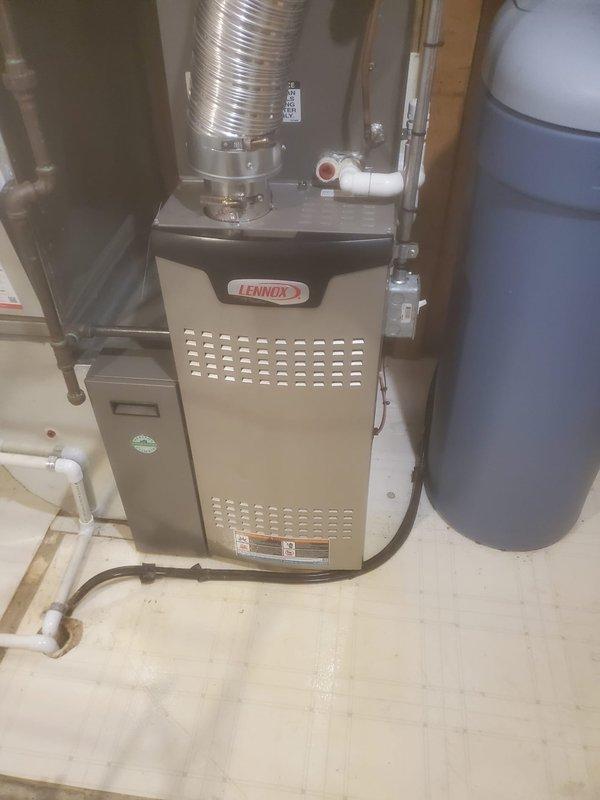 Performed annual heating maintenance on 8-year-old Lennox furnace system located in basement. Inspected and tested all components including blower motor, circuit board connections, and ventilation system. Unit is functioning properly with no issues detected; service completed within scheduled morning timeframe.