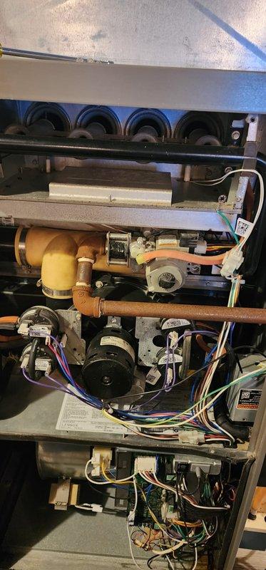 Performed scheduled prepaid maintenance on Lennox furnace system. Inspected all components including heat exchanger tubes, draft inducer motor, and control assembly - all functioning properly. Diagnosed and repaired leaking humidifier issue that customer had previously disabled. System restored to full operational status with all safety checks completed.