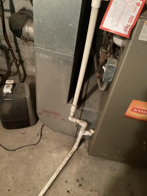 Completed replacement estimate for a furnace system featuring a Cause USA unit and a red-tagged Bryant furnace. Documented existing installation with photos showing the complete system setup including PVC drainage pipes, electrical connections, and ductwork with reflective foil insulation. Recommendation needed for full replacement of the commercial 10A-12 furnace system.