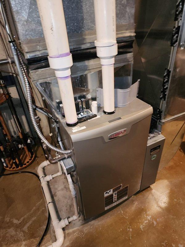 Performed routine maintenance on two Lennox HVAC systems per Worry Free Service Agreement. Inspected furnace components, ventilation pipes, condensate drain lines, and ductwork connections. Both systems were found in good working condition with proper PVC exhaust/intake venting and no visible damage or deterioration.
