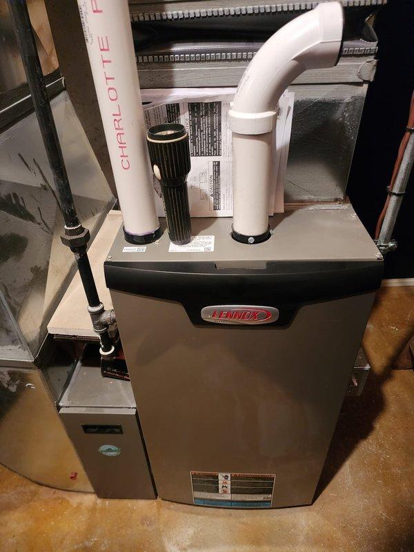Performed routine maintenance on two Lennox HVAC systems per Worry Free Service Agreement. Inspected furnace components, ventilation pipes, condensate drain lines, and ductwork connections. Both systems were found in good working condition with proper PVC exhaust/intake venting and no visible damage or deterioration.