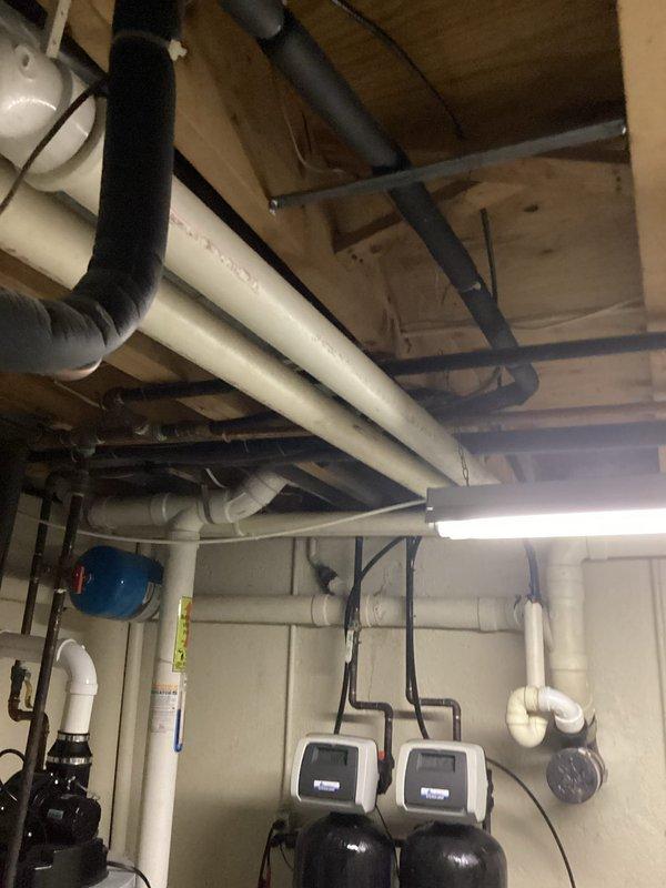 Performed comparative estimate for furnace replacement after customer reported another company diagnosed failed inducer motor and cracked heat exchanger in their 18-year-old unit. Visual inspection confirmed aging system with standard PVC venting configuration and adequate installation space in utility room. Complete system replacement recommended due to critical safety concerns and equipment age.