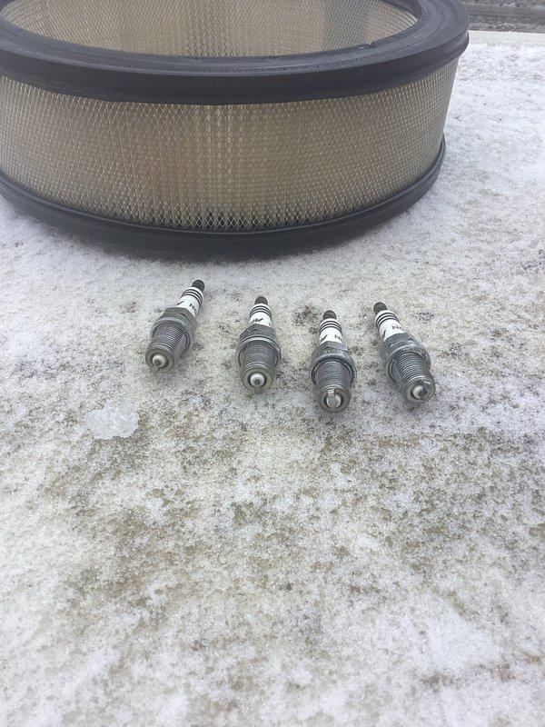 Performed scheduled maintenance on Generac 60kW generator including replacement of air filter and four spark plugs. Inspected internal components, control panel, and electrical connections to ensure proper operation. Generator was tested and returned to service in good working condition.