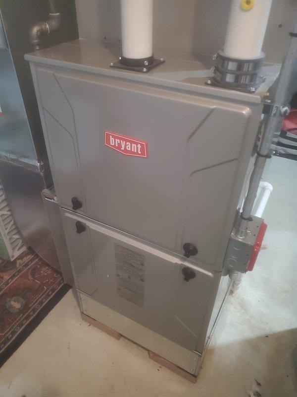 Performed comprehensive furnace maintenance on Bryant HVAC system. Inspected internal components including blower motor assembly, electrical connections, and circuit board. Verified proper installation of PVC venting system and confirmed all components are functioning correctly.
