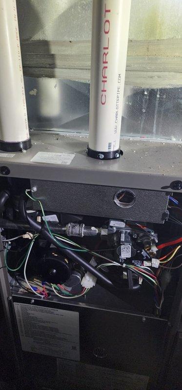 Performed annual maintenance on Lennox furnace under Worry Free Service Agreement. Inspected internal components including gas valve assembly, control board, and wiring connections. Verified proper installation and condition of PVC exhaust/intake piping (Charlotte Pipe) and checked all electrical connections for safety and functionality.