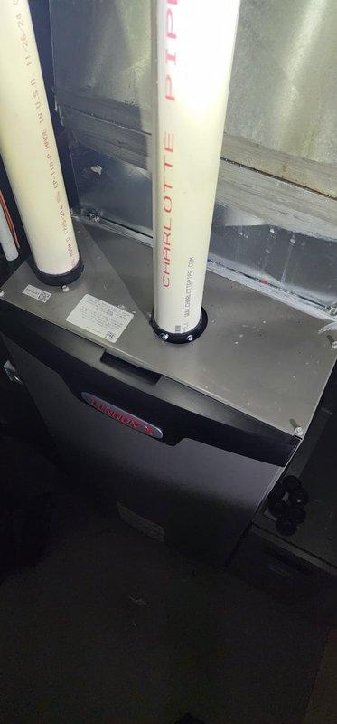 Performed annual maintenance on Lennox furnace under Worry Free Service Agreement. Inspected internal components including gas valve assembly, control board, and wiring connections. Verified proper installation and condition of PVC exhaust/intake piping (Charlotte Pipe) and checked all electrical connections for safety and functionality.