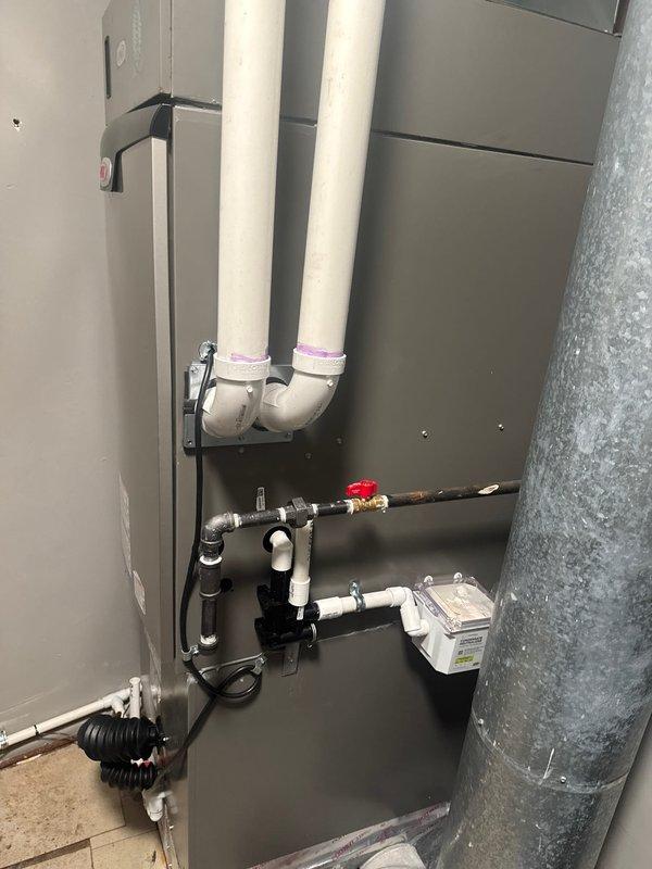 Successfully installed complete HVAC system including new Lennox furnace, air conditioner, and Ecobee6 thermostat. Performed proper installation of all components including PVC intake/exhaust venting, condensate drainage system, and electrical connections with service switch. System was fully tested and verified operational upon completion.