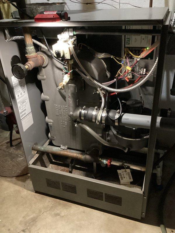 Performed comprehensive boiler maintenance service on Lennox heating system. Conducted full inspection of combustion chamber, heat exchanger, electrical components, and gas connections. System tested and verified to be operating within manufacturer specifications; documentation completed for consumer rebate program.