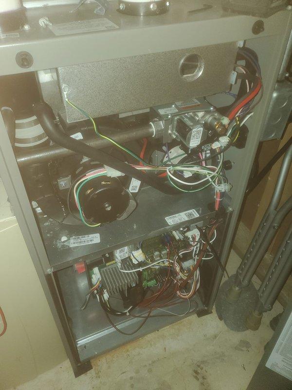 Performed comprehensive furnace maintenance on Lennox heating system. Inspected all internal components including blower motor assembly, control boards, and wiring connections. Verified proper operation of PVC intake/exhaust venting system and confirmed drainage piping was functioning correctly with no signs of leakage or blockage.