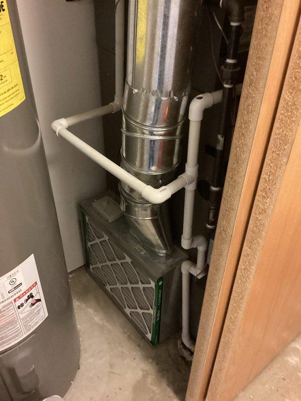 Conducted comprehensive evaluation of existing Lennox HVAC system located in utility closet. System includes furnace unit with attached air handler, connected ductwork, and PVC condensate drainage. Assessment performed to determine replacement options and provide estimate for full system upgrade.