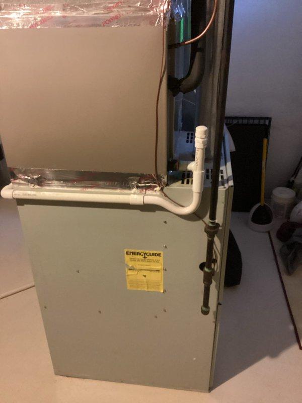 Conducted HVAC system evaluation for replacement quote (CQ Quote: 03743-01). Inspected existing TotalLine air handler/furnace unit with connected galvanized sheet metal ductwork and associated control systems. Documented current installation configuration including ventilation setup with PVC piping, copper line connections, and ductwork layout for comprehensive replacement estimate.