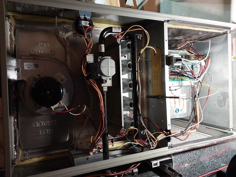 Performed scheduled maintenance on furnace under Worry Free Service Agreement. Accessed internal components for inspection, including blower motor assembly, control board, and gas valve assembly. All electrical connections and wiring were verified secure with no visible issues observed.