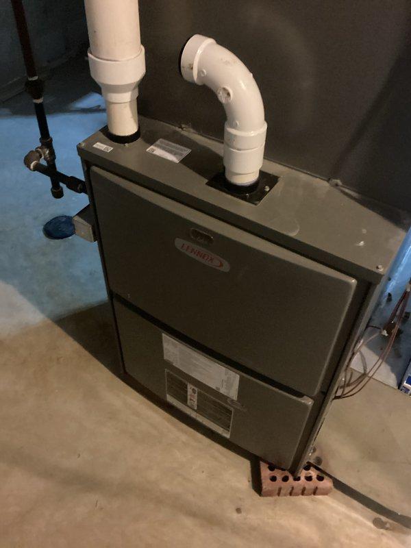 Completed furnace replacement due to age-related deterioration and inducer motor over-amping (12-2). Installed new Lennox system with proper PVC venting configuration and verified all connections. Existing ductwork was inspected and secured with appropriate insulation to ensure optimal system performance.
