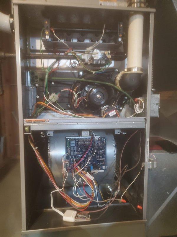 Performed standard maintenance on Carrier furnace, including inspection of control board connections, blower motor assembly, and wiring. Examined all electrical components and checked heat exchanger for proper operation. System is functioning within normal parameters after tune-up service.