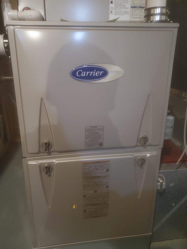 Performed standard maintenance on Carrier furnace, including inspection of control board connections, blower motor assembly, and wiring. Examined all electrical components and checked heat exchanger for proper operation. System is functioning within normal parameters after tune-up service.