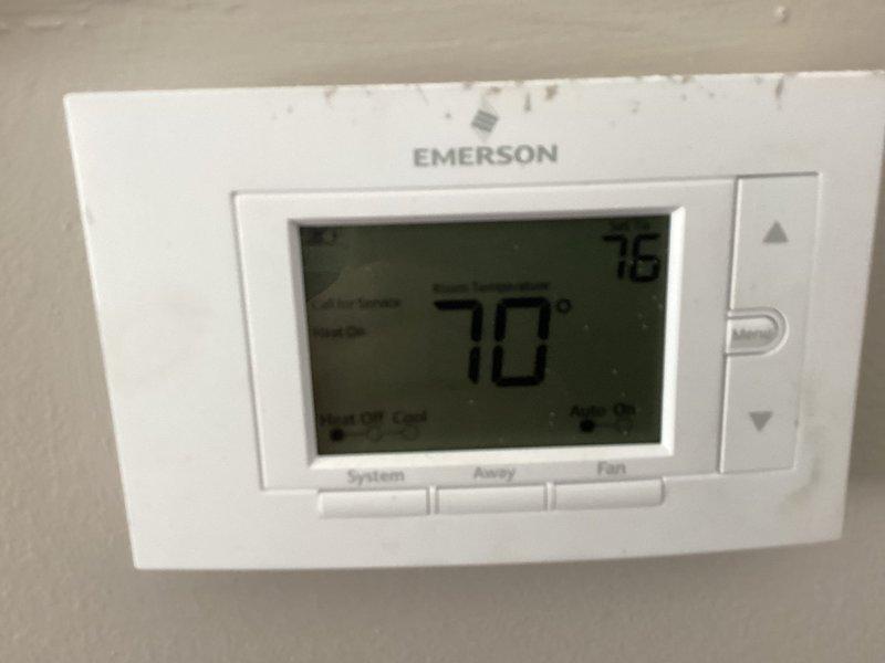 Successfully installed new Lennox furnace in basement utility area, replacing previous unit and ensuring proper connection to existing ductwork. Connected system to Emerson digital thermostat, verified proper operation with heating function active and system maintaining desired temperature settings.