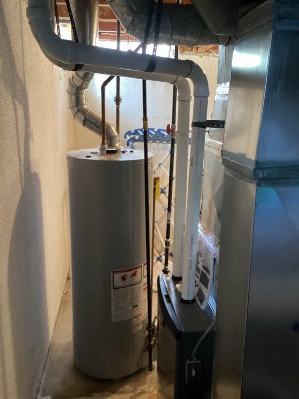 Successfully installed new Lennox furnace in basement utility area, replacing previous unit and ensuring proper connection to existing ductwork. Connected system to Emerson digital thermostat, verified proper operation with heating function active and system maintaining desired temperature settings.