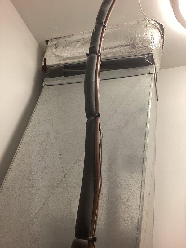 Conducted HVAC replacement estimate for residential system featuring a Lennox furnace unit with PVC exhaust/intake ventilation and connected ductwork. Assessment included evaluation of existing air handler with insulated line set and reflective foil insulation. Photos documented current installation configuration to support comprehensive replacement proposal.