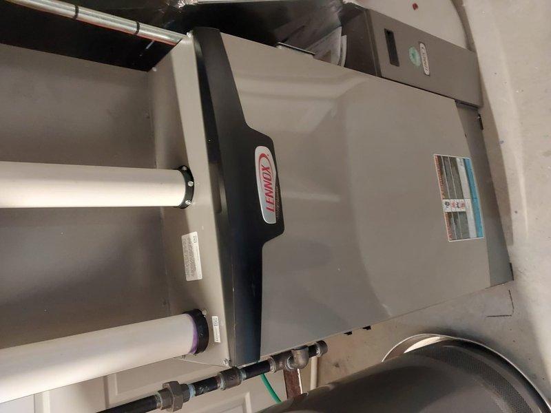 Performed scheduled maintenance on Lennox furnace system per Worry Free Service Agreement. Inspected exterior cabinet, PVC intake/exhaust venting, and copper piping connections, all in good condition. Accessed internal components to examine gas valve assembly, wiring harnesses, and blower motor assembly, confirming proper operation with no signs of damage or deterioration.