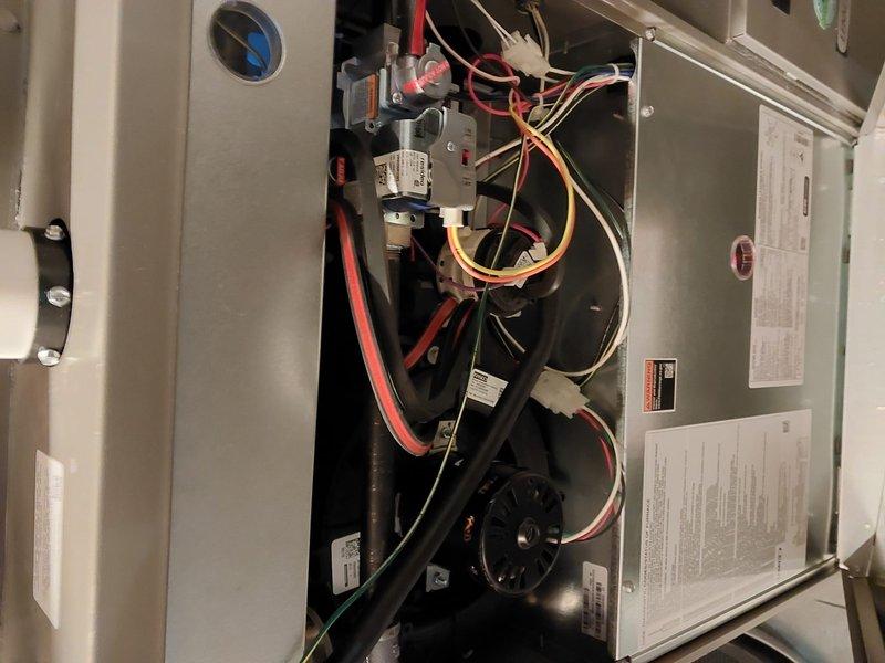 Performed scheduled maintenance on Lennox furnace system per Worry Free Service Agreement. Inspected exterior cabinet, PVC intake/exhaust venting, and copper piping connections, all in good condition. Accessed internal components to examine gas valve assembly, wiring harnesses, and blower motor assembly, confirming proper operation with no signs of damage or deterioration.