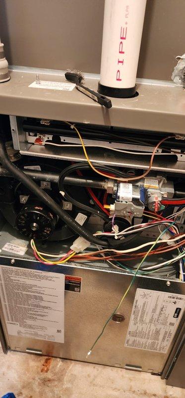 Completed semi-annual maintenance service on two-system FRN unit. Performed comprehensive inspection with access panels removed to examine internal components including wiring harnesses, electrical control modules, and fan assembly. All mechanical components and PVC ventilation piping were found to be in normal working condition with no signs of deterioration or damage requiring repair.