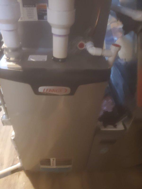 Completed routine maintenance on Lennox furnace under Worry Free Service Agreement. Performed comprehensive inspection of internal components including blower motor, circuit board, and electrical wiring. Verified proper operation of all systems with front panel removed to access critical components.