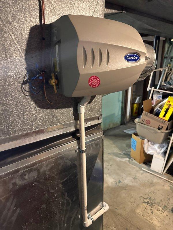 Successfully installed new Lennox furnace with proper ventilation and drainage systems, including PVC exhaust/intake piping and condensate pump. Relocated existing thermostat and integrated the system with the customer's Carrier humidifier unit for optimal home comfort.