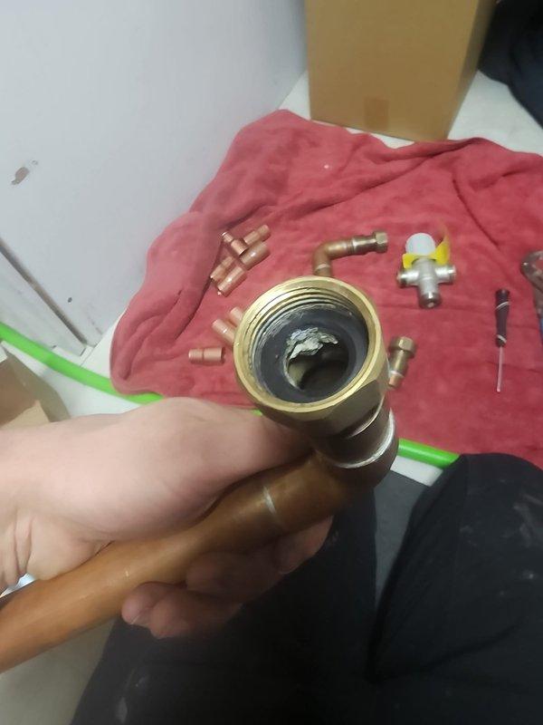 Returned to property to complete 75-gallon water heater installation. Determined existing expansion tank was insufficient and additional 1" copper fittings were required to properly reinstall the mixing valve. Scheduled follow-up appointment between 8-12 to complete installation with proper components.