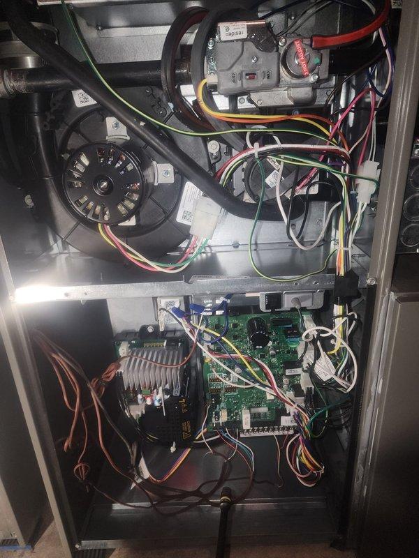Performed scheduled maintenance service on two Lennox furnace systems. Inspected interior components including control board, wiring connections, motor assembly, and heat exchanger - all systems functioning properly. Completed comprehensive diagnostic check of both units with no operational issues identified.