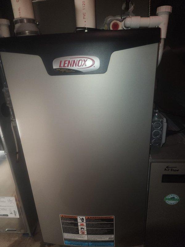 Performed scheduled maintenance service on two Lennox furnace systems. Inspected interior components including control board, wiring connections, motor assembly, and heat exchanger - all systems functioning properly. Completed comprehensive diagnostic check of both units with no operational issues identified.