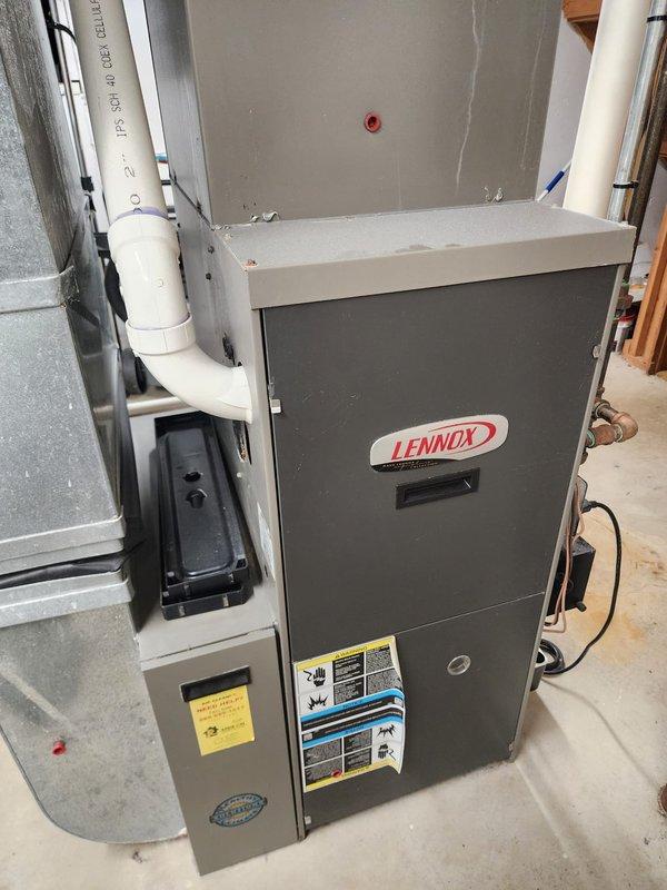 Performed scheduled FRN maintenance on Lennox furnace system. Upon inspection, identified significant rust and corrosion on the lower cabinet panel beneath the control board with multiple wire connections. Documented condition with photos while completing standard heating system maintenance procedures.