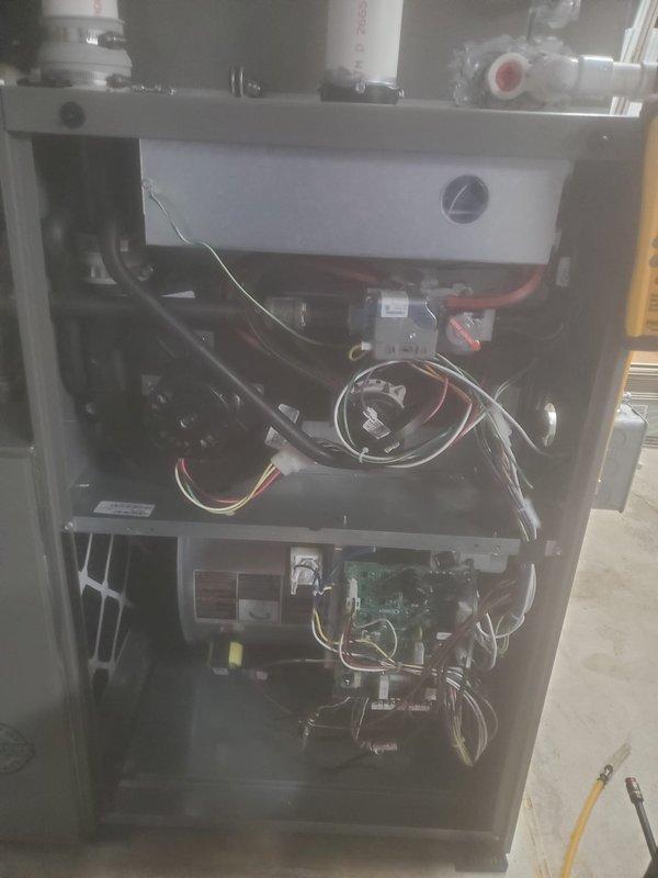 Completed prepaid maintenance service on a Lennox furnace system. Removed front panel to inspect internal components including control boards, wiring connections, and heat exchange elements. Checked PVC venting system and valve connections, ensuring proper function of all components per manufacturer specifications.
