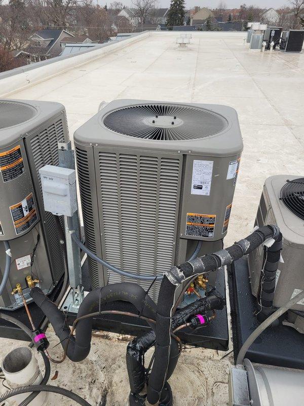 Successfully installed complete Lennox HVAC system including furnace, air conditioner, and S40 thermostat. Multiple condenser units were professionally mounted on the rooftop with proper insulation on all refrigerant lines. System was fully tested and is operating according to manufacturer specifications.