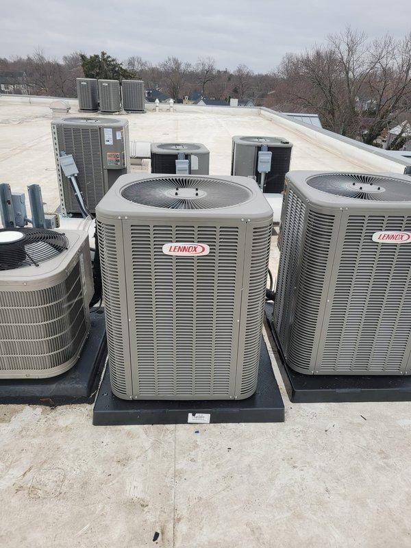 Successfully installed complete Lennox HVAC system including furnace, air conditioner, and S40 thermostat. Multiple condenser units were professionally mounted on the rooftop with proper insulation on all refrigerant lines. System was fully tested and is operating according to manufacturer specifications.