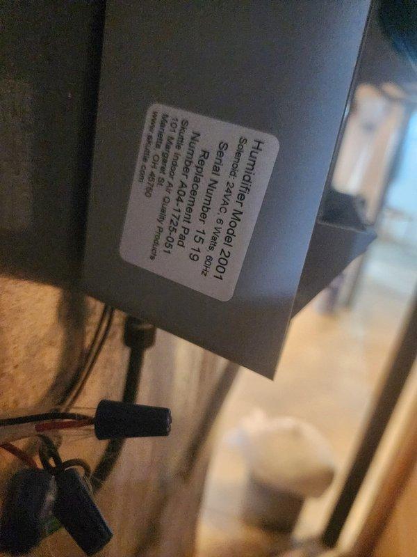 Diagnosed and serviced leak issue beneath furnace. Discovered deterioration of surrounding frame with significant debris accumulation. Inspected associated humidifier (Model 2001) and documented serial number for warranty purposes.