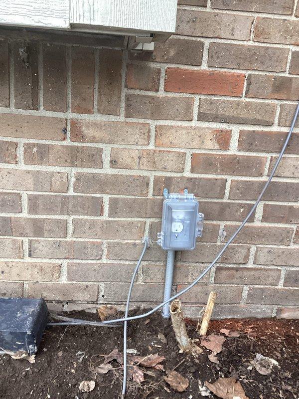 Diagnosed and repaired a non-functioning exterior weatherproof electrical outlet and its associated switch. Inspected connections in both the brick-mounted GFCI outlet box and the related interior switch, resolving the issue by replacing damaged wiring and ensuring proper grounding of the outdoor fixture.