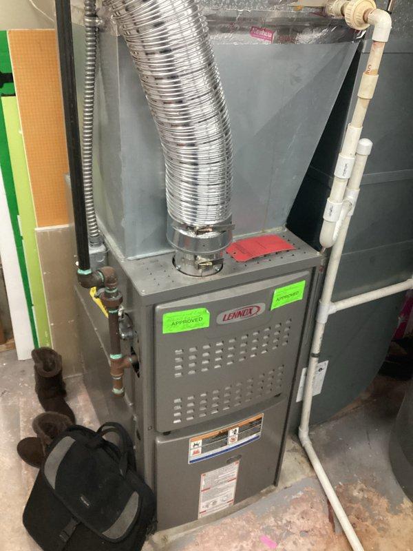 Performed a site assessment for replacement of aging AC unit with documentation of existing Lennox HVAC system. Evaluated current installation configuration including ductwork, PVC ventilation piping, and refrigerant lines to determine compatibility requirements for new equipment. Documented system location and access considerations for future replacement work.