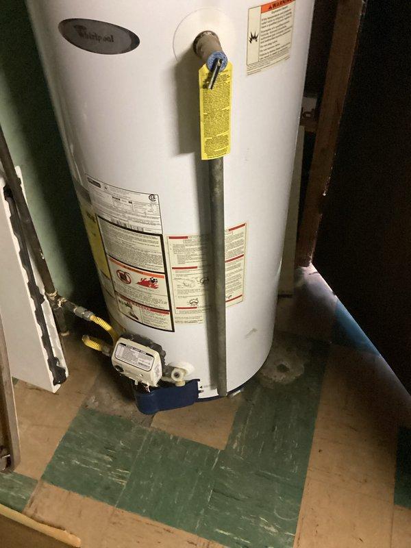 Performed assessment of Whirlpool water heater due to customer complaint of frequently running out of hot water. Inspection revealed an aging unit with potential capacity issues. Recommended replacement with appropriately sized water heater to meet household demand and provided quote for installation including necessary venting and plumbing connections.