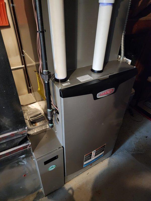 Completed heating maintenance service on dual Lennox furnace system per Worry Free Service Agreement. Inspected both units, verified proper venting through PVC exhaust pipes, and checked all electrical and plumbing connections. Both systems are in good working condition with no signs of damage or deterioration.