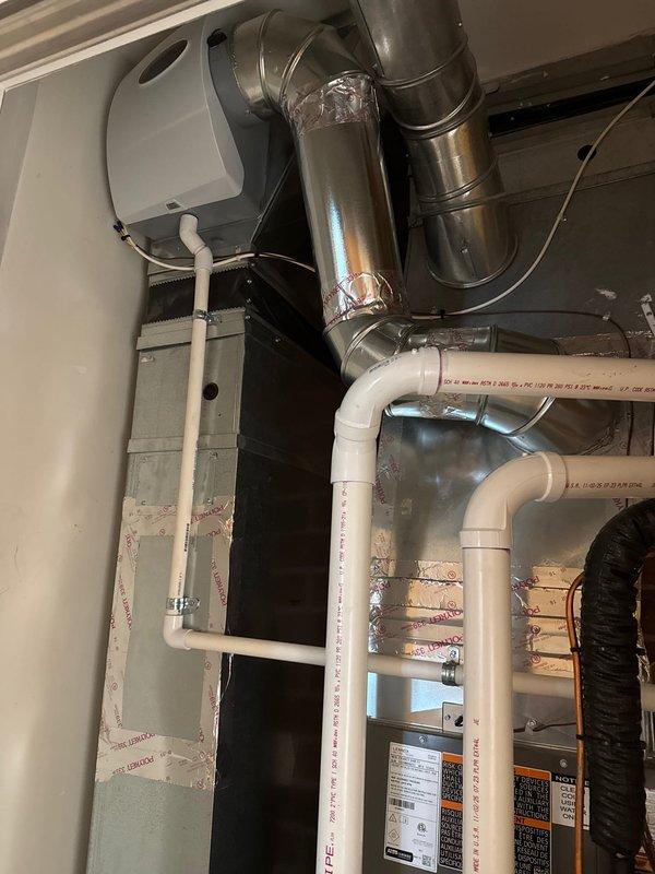 Successfully completed installation of two identical Lennox HVAC systems, each including a furnace, air conditioner, S40 thermostat, and humidifier. Systems were properly mounted with appropriate drain pans, with all ductwork, PVC venting, electrical connections, and condensate lines installed according to manufacturer specifications.