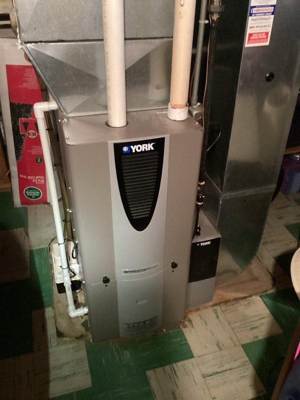 Performed comprehensive evaluation of existing HVAC system, including York furnace with dual PVC ventilation and connected air handler. Documented condition of Rheem Performance water heater with associated plumbing connections. Completed full system assessment for potential replacement options and provided customer with detailed estimate for system upgrade.