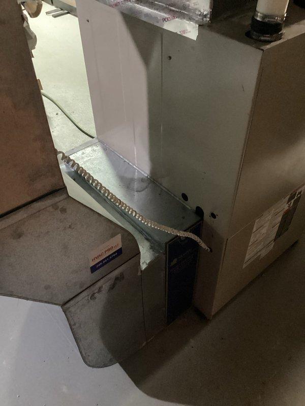 Inspected 30-year-old furnace system and confirmed failed blower motor bearings requiring replacement. Existing unit shows typical age-related wear with deteriorating galvanized cabinet and outdated efficiency standards. Recommended complete system replacement to address reliability concerns and improve energy efficiency.