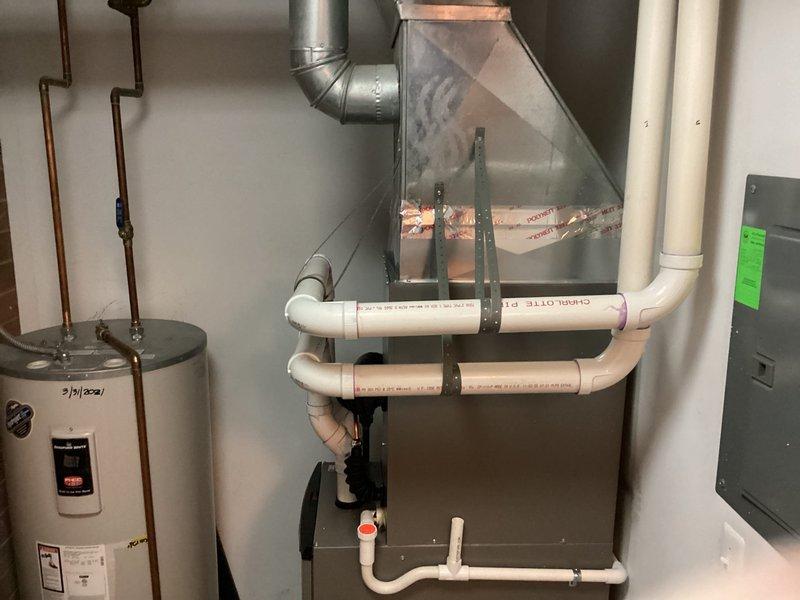 Successfully installed complete HVAC system including new Lennox furnace, air conditioner, and Ecobee6 smart thermostat. System installation included proper connection of condensate drain lines, ductwork integration, and verification of all electrical connections. Final inspection confirmed proper operation of all components with filter properly installed.