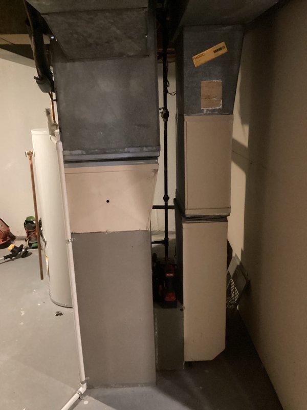 Completed estimate for complete HVAC system replacement including new outdoor condenser unit and indoor air handler/furnace. Current system shows standard installation on concrete pad adjacent to brick exterior with proper electrical and refrigerant line connections. Basement utility room assessment revealed existing ductwork that will be utilized for the new installation. Recommended replacement will improve system efficiency and reliability.