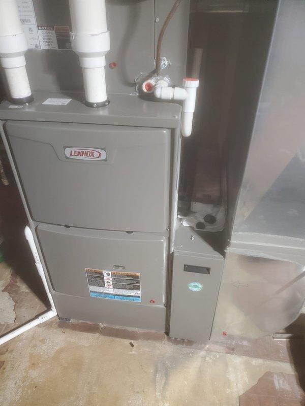 Performed scheduled maintenance on Lennox HVAC system. Inspected furnace components including control board, electrical connections, blower motor assembly, and ventilation pipes. System functioning properly with no issues detected; all components in good working condition.