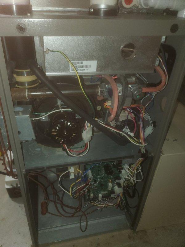 Performed routine maintenance on Lennox heating system under Worry Free Service Agreement. Conducted thorough inspection of internal components including blower assembly, circuit board, and electrical connections. Documented system condition with photos showing proper installation of ventilation piping and confirmed unit is operating within manufacturer specifications.