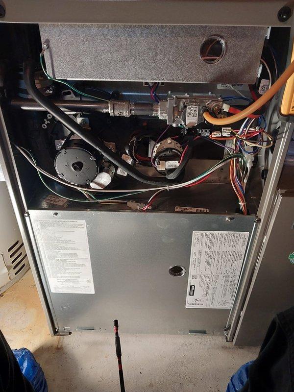 Performed scheduled Worry Free Service Agreement maintenance on heating system. Inspected furnace interior components including blower motor assembly, electrical connections, and control board for proper operation. Examined heat exchanger/coil assembly for cleanliness and integrity with no issues found.