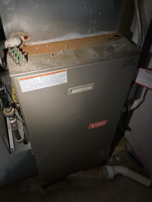 Completed inspection of existing Bryant furnace system with significant dust accumulation and aging components. Quote provided for replacement options (CQ Quote: 03788-02, 03788-05, 03788-06) with comprehensive HVAC estimate detailing 5-6 potential packages. Documented current installation configuration including copper line connections, PVC venting, and valve assemblies for accurate replacement planning.