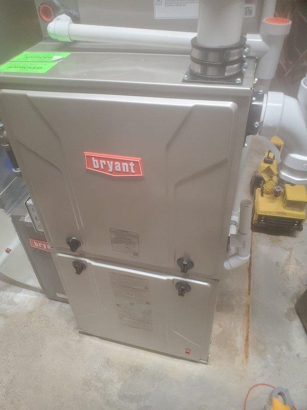 Completed scheduled prepaid maintenance on two Bryant HVAC systems. Performed comprehensive inspection of both furnace units, including examination of internal components (wiring, control boards, blower motor, PVC venting pipes). All systems functioning properly with no issues identified.